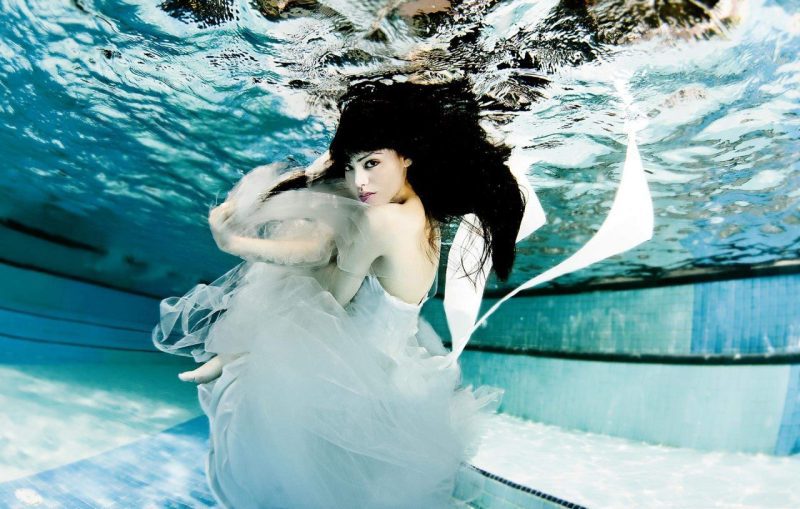 Singapore commercial photography. Underwater bridal fashion in swimming pool — underwater portrait photographer singapore, underwater photography singapore