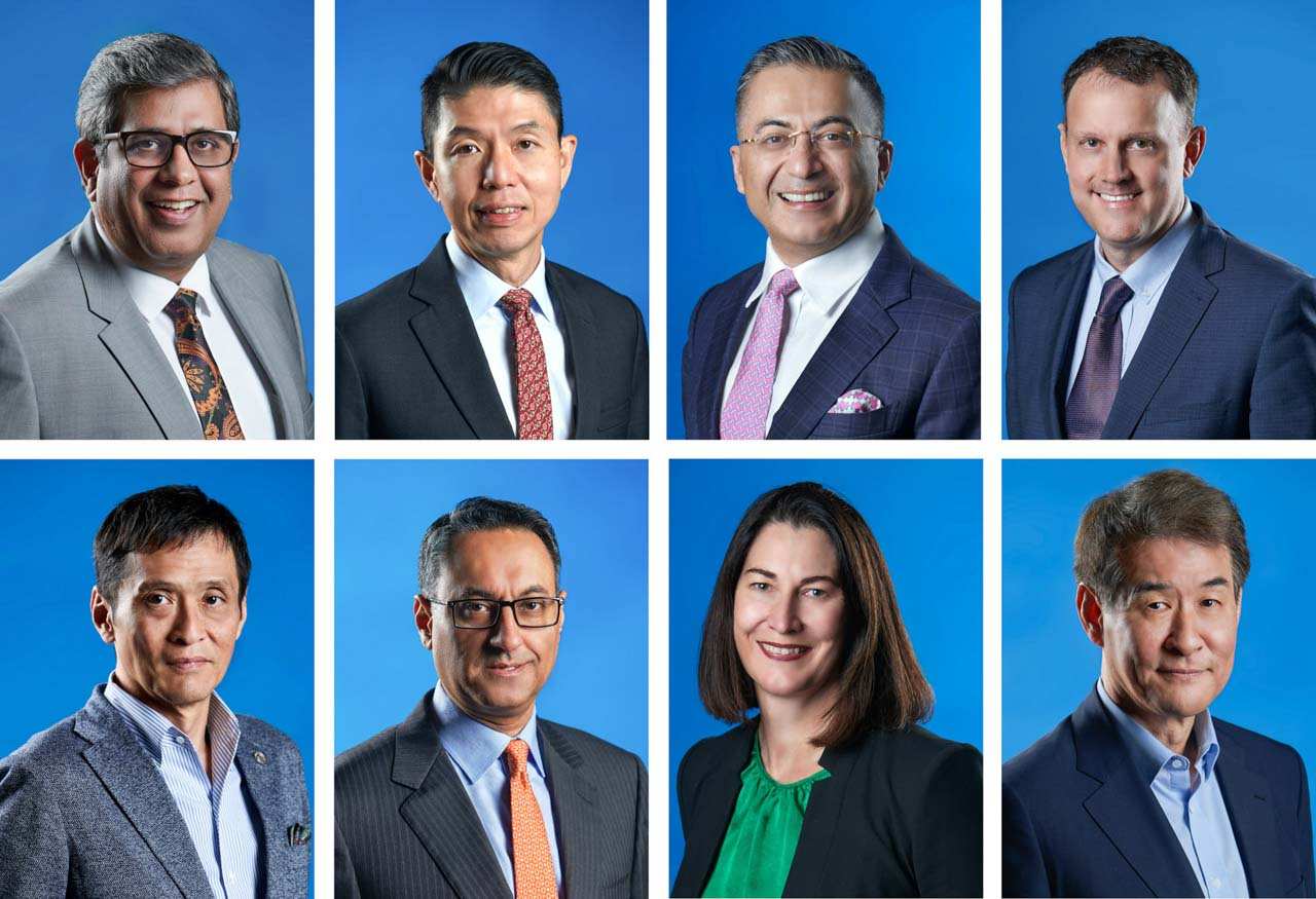 Dell Technologies APJ leaders colour corporate portraits on a blue background, Singapore studio session — corporate portrait photographer singapore