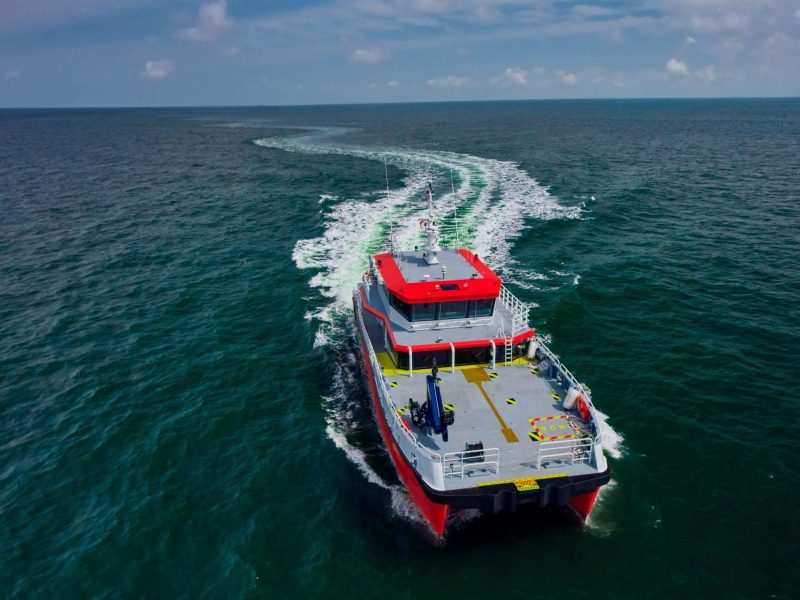 Aerial photograph of the first Brevity class catamaran running at high speed on sea trial — Singapore industrial photography, marine aerial, vessel drone photography