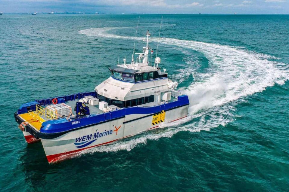 WEM Marine crew transfer catamaran under way during a manoeuvrability trial — Singapore industrial photographer, sea trial photography, aerial maritime photography