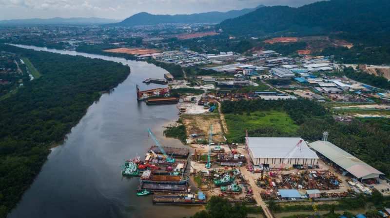 Aerial view of a shipyard on the river with vessels alongside the fitting-out quay — Singapore industrial photographer, shipyard photography, aerial maritime photography